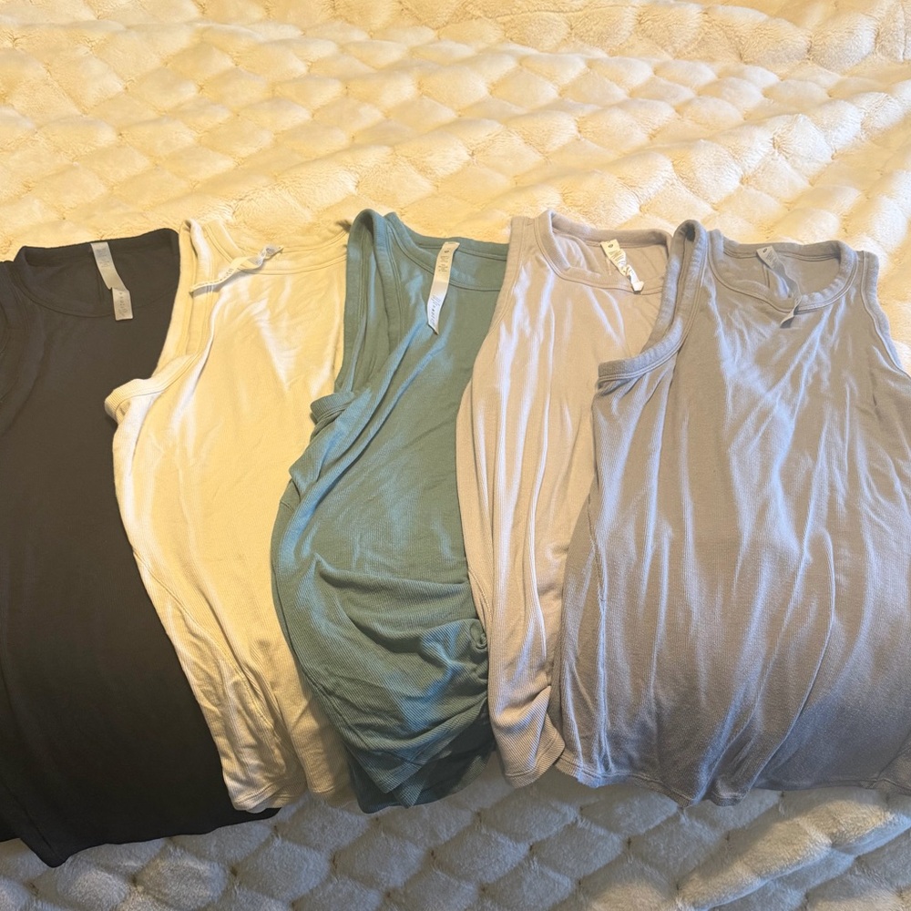 Bundle of 5 Lululemon Hold Tight Tank Tops in excellent condition.